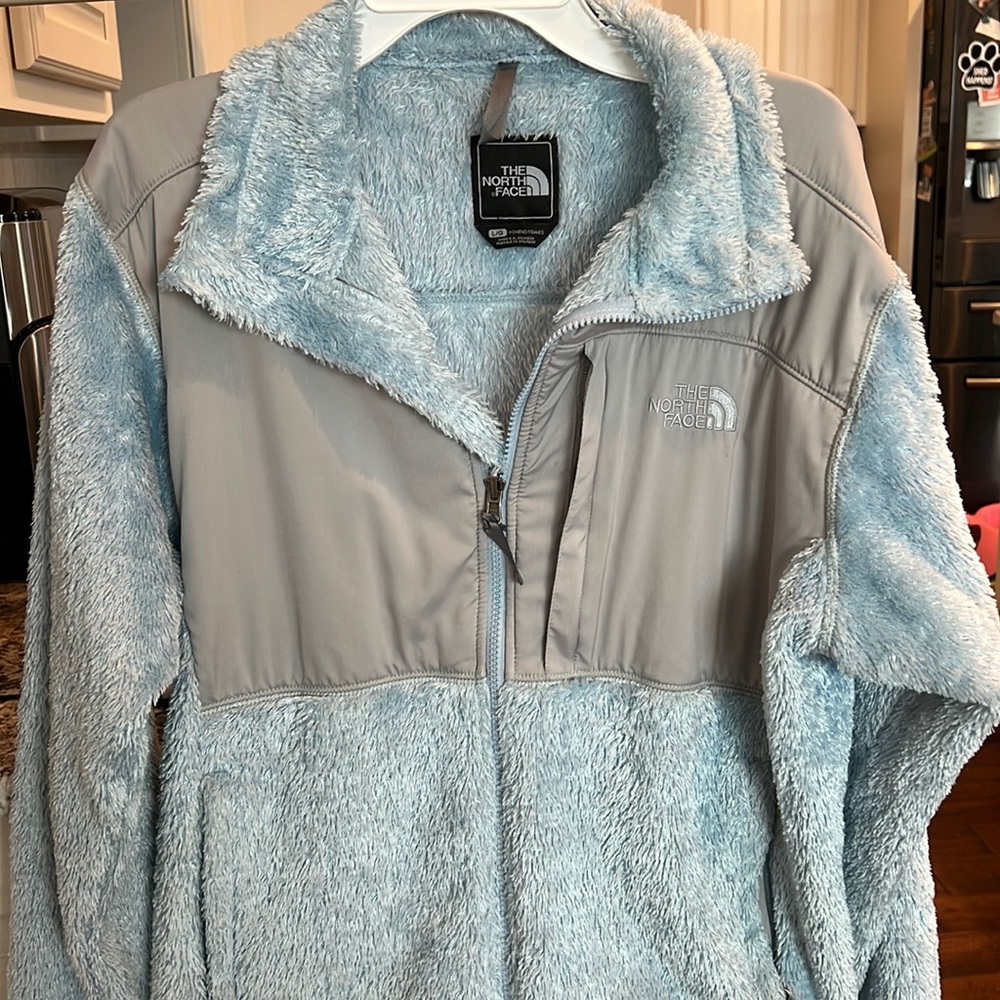 Light blue North Face women large jacket